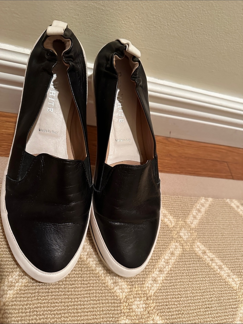 Women’s Black Slip-On Leather Sneakers with White Trim